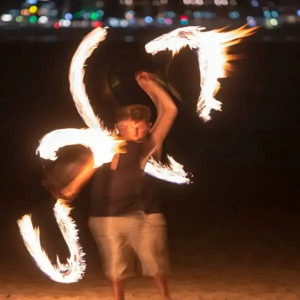 Alec fire staff spinning night