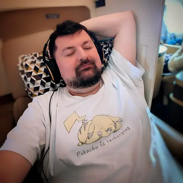 Alec napping headphones pikachu shirt