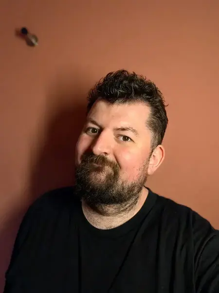 Alec portrait terracotta wall