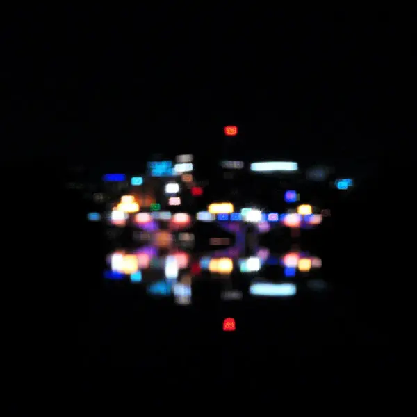 Bokeh city lights water reflection
