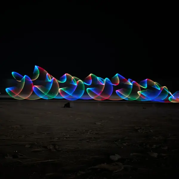 LED staff on the beach (Long exposure shot)