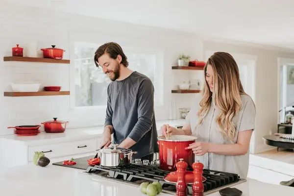 A couple cooking